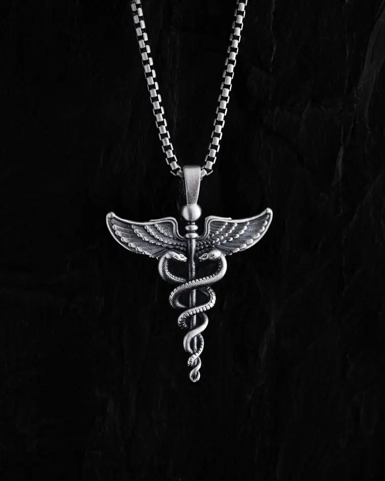 Srebrny wisiorek CADUCEUS