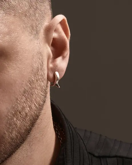 Srebrny kolczyk koło FARLIG 2