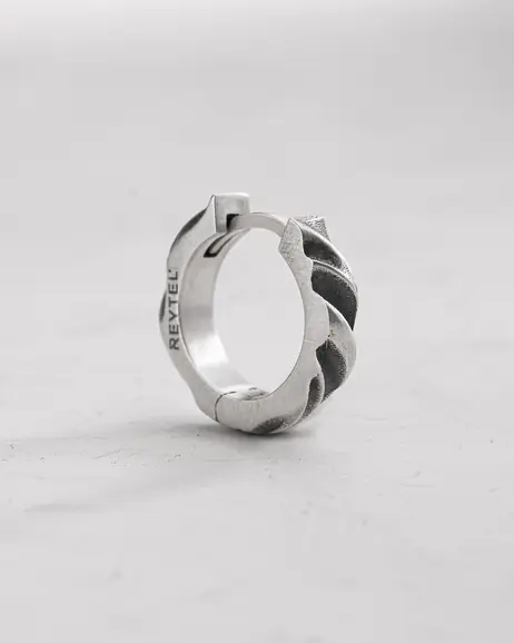 Srebrny kolczyk koło FORGED