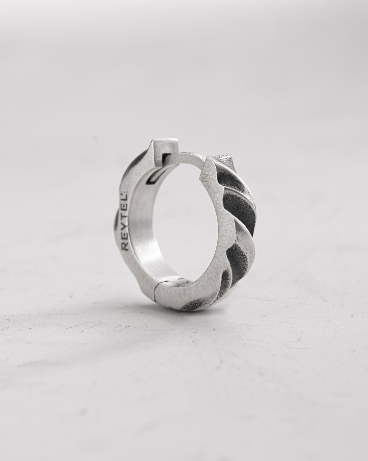Srebrny kolczyk koło FORGED